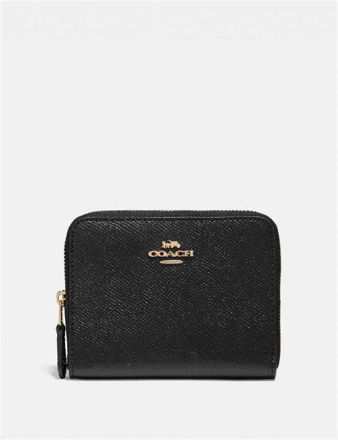 coach zipper wallets for women.